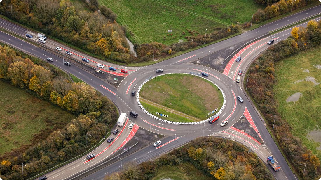 Aerial view of Flanders Roundabout showing the turbo roundabout layout, raised lane separators and approach markings.